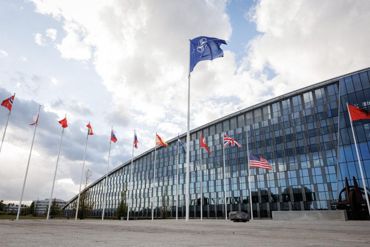 Flags of NATO members fly at the NATO headquarters in Brussels on Sept. 12, 2025. (Simon Wohlfahrt/AFP via Getty Images)