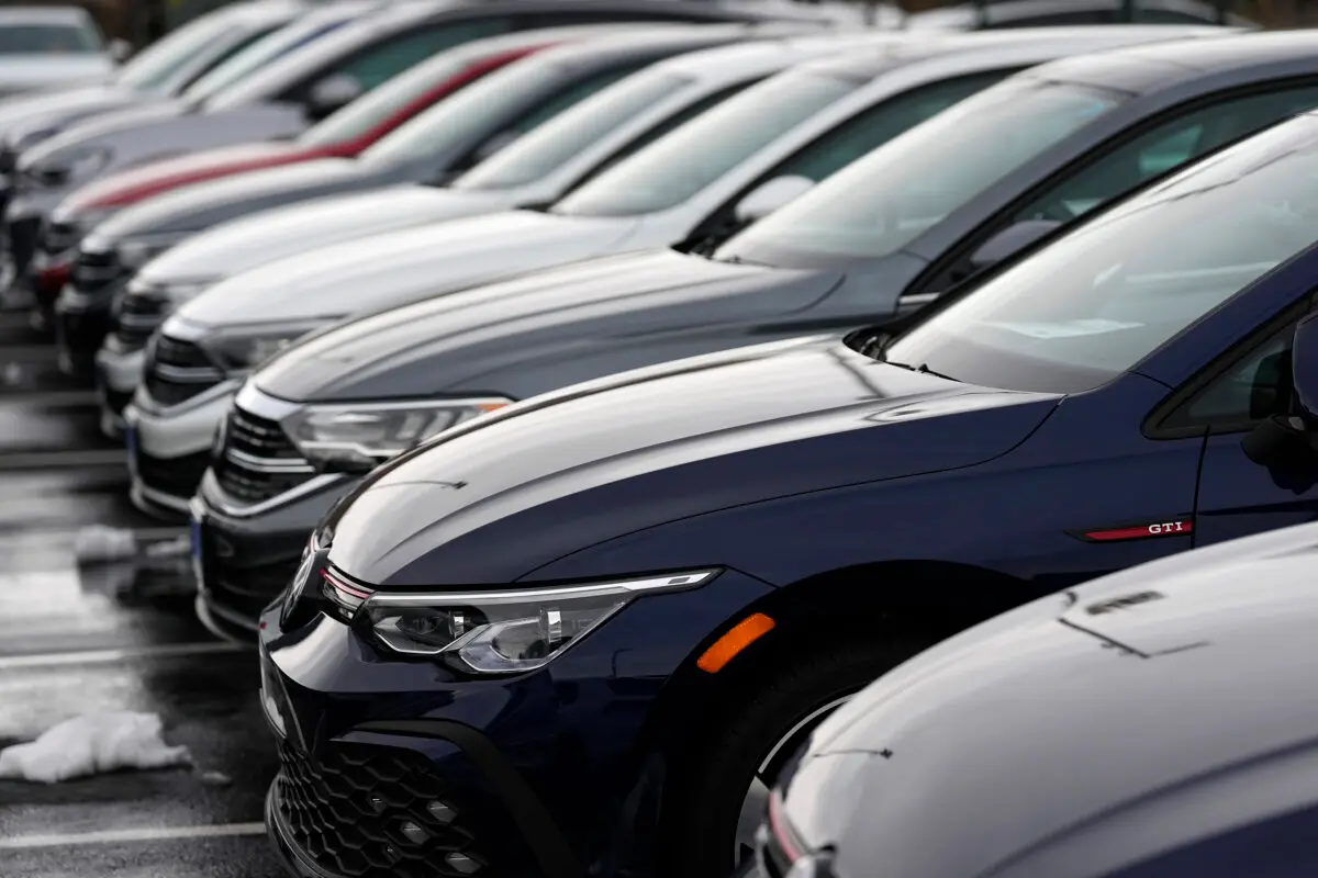 A line of unsold 2024 GTI and Jetta sedans sits at a Volkswagen dealership in Denver on March 17, 2024. (David Zalubowski/AP)