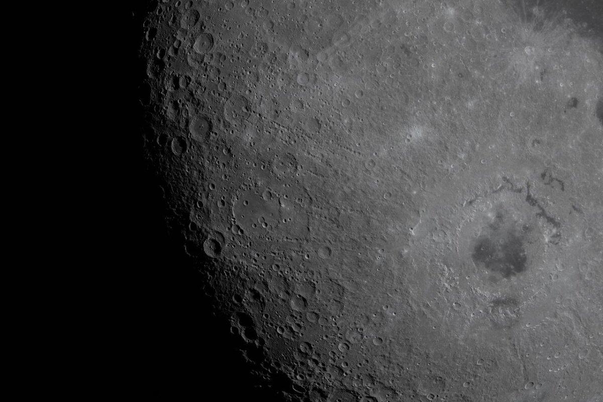 The Artemis II crew captured this image of the moon, showing the rings of the Orientale basin, during their flyby on April 6, 2026. (Courtesy of NASA)