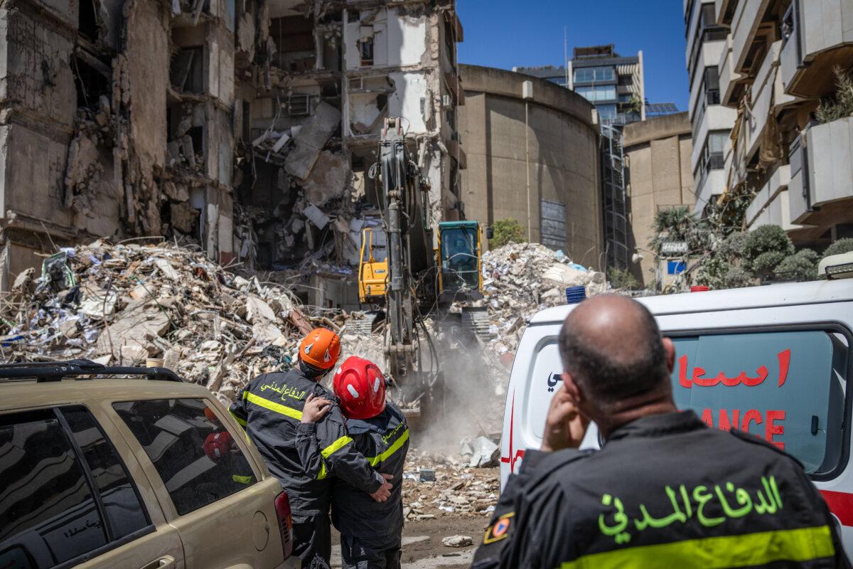A bulldozer clears rubble from a building destroyed on April 08 in an Israeli airstrike on April 09, 2026 in Beirut, Lebanon. (Chris McGrath/Getty Images)