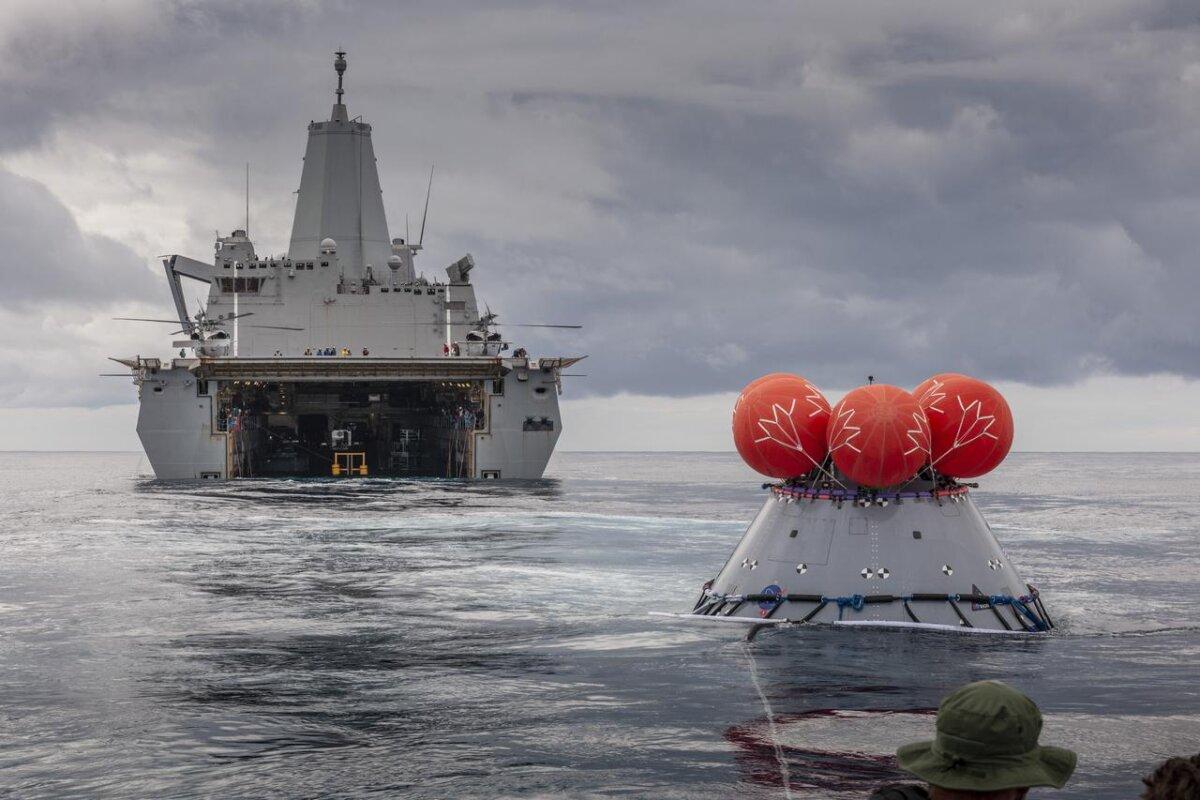 The USS John P. Murtha pictured with an Orion crew capsule during a recovery test in preparation for NASA’s Artemis I uncrewed test flight on March 14, 2020. (NASA)