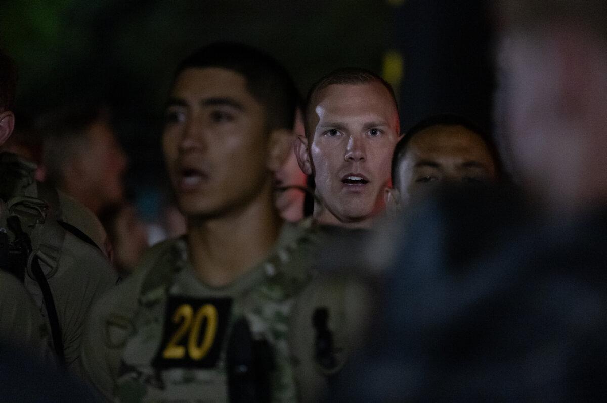 Competitors in the 2026 Best Ranger Competition recite the Ranger Creed before the start of the three-day event on April 10, 2026. (John Fredricks/The Epoch Times)