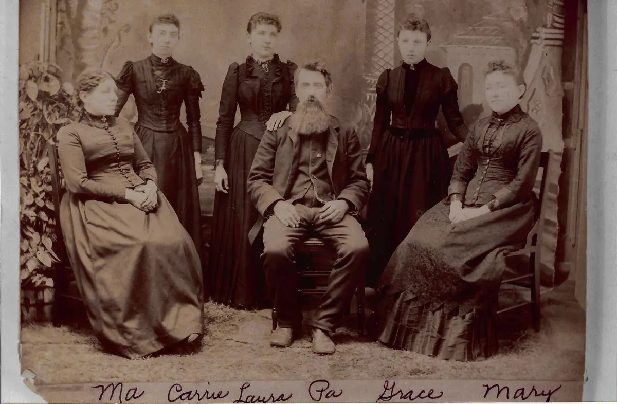 This 1894 photograph of the entire Ingalls family was taken shortly before Laura left for Mansfield, Mo. (Seated L–R) Caroline, Charles, and Mary. (Standing L–R) Carrie, Laura, and Grace. (Laura Ingalls Wilder Home & Museum)