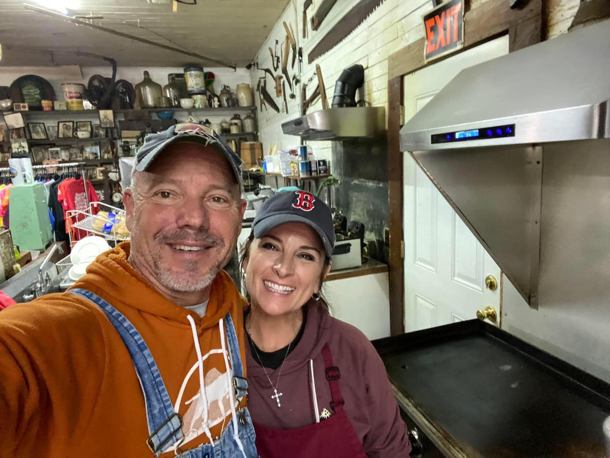 Doug and Tiffany Garrett in their store. (Deena Bouknight)
