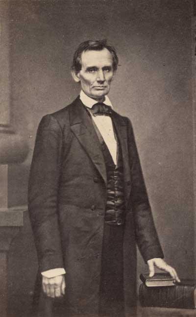 Lincoln, in a stately pose for Mathew Brady. National Archives. (Public Domain)