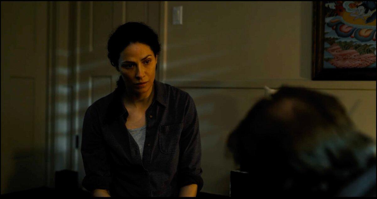 Athena (Joanne Kelly) in a meditation room, in "American Solitaire." (Executive Productions)