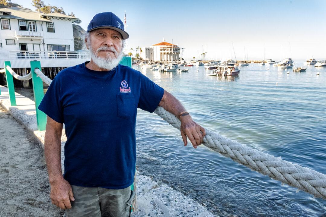 Pastor Lopez, a 77-year-old Vietnam veteran, stands near the beaches of Avalon, Calif., on March 18, 2026. Lopez, who witnessed aerial gunners shooting wild goats in the late 1980s and early 1990s, said the methods used to eradicate the animals were “inhumane” and “cruel.” (John Fredricks/The Epoch Times)