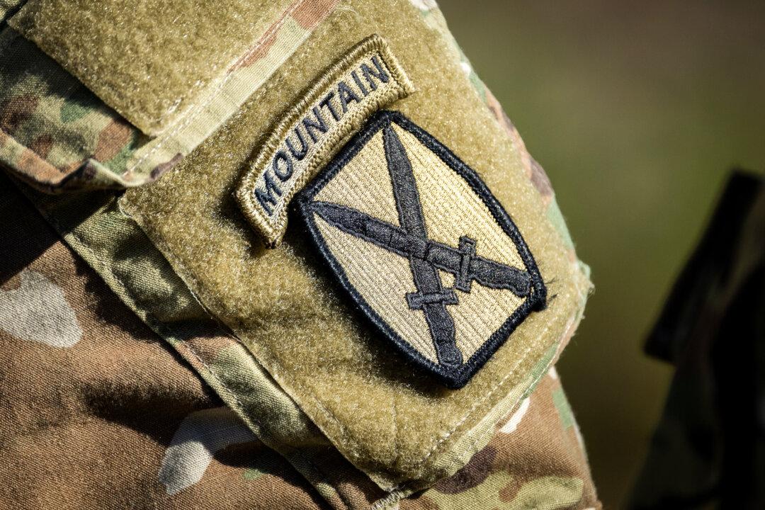 (Top, Bottom Right) Snipers with the U.S. Army perform shooting exercises at Fort Benning, Ga., on April 8, 2026. Unlike other competitions at Infantry Week, the International Sniper Competition was open not only to members of the Army but also to the Marine Corps, the Navy, and international competitors. (Bottom Left) Soldiers with the U.S. Army’s 10th Mountain Division perform shooting exercises at Fort Benning, Ga., on April 8, 2026. (John Fredricks/The Epoch Times)