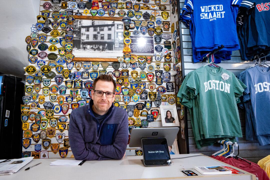 Dan DelGaudio stands inside his shop next to the Paul Revere House in Boston on April 8, 2026. DelGaudio’s family has operated the store since 1894, sustained for four generations by tourists visiting the historic site, he said. (Samira Bouaou/The Epoch Times)