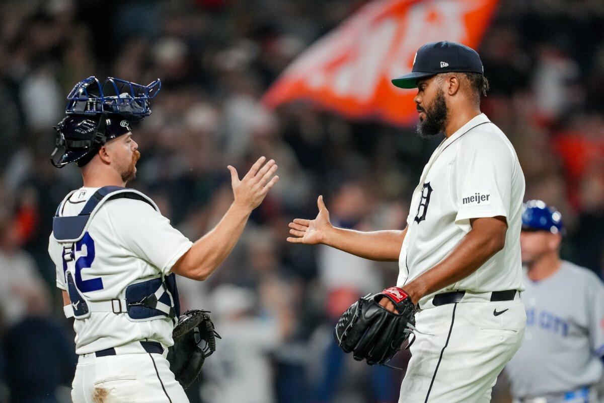 Jake Rogers (L) and Kenley Jansen of the Tigers celebrate beating the Kansas City Royals at Comerica Park in Detroit on April 15, 2026. Jansen now has 480 saves. (Nic Antaya/Getty Images)