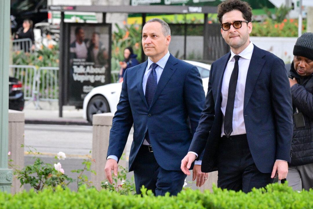 Cristos Goodrow (L), YouTube vice president of engineering, arrives at Los Angeles Superior Court for a trial examining whether social media companies designed their platforms to be addictive to children in Los Angeles on Feb. 23, 2026. (Frederic J. Brown/AFP via Getty Images)