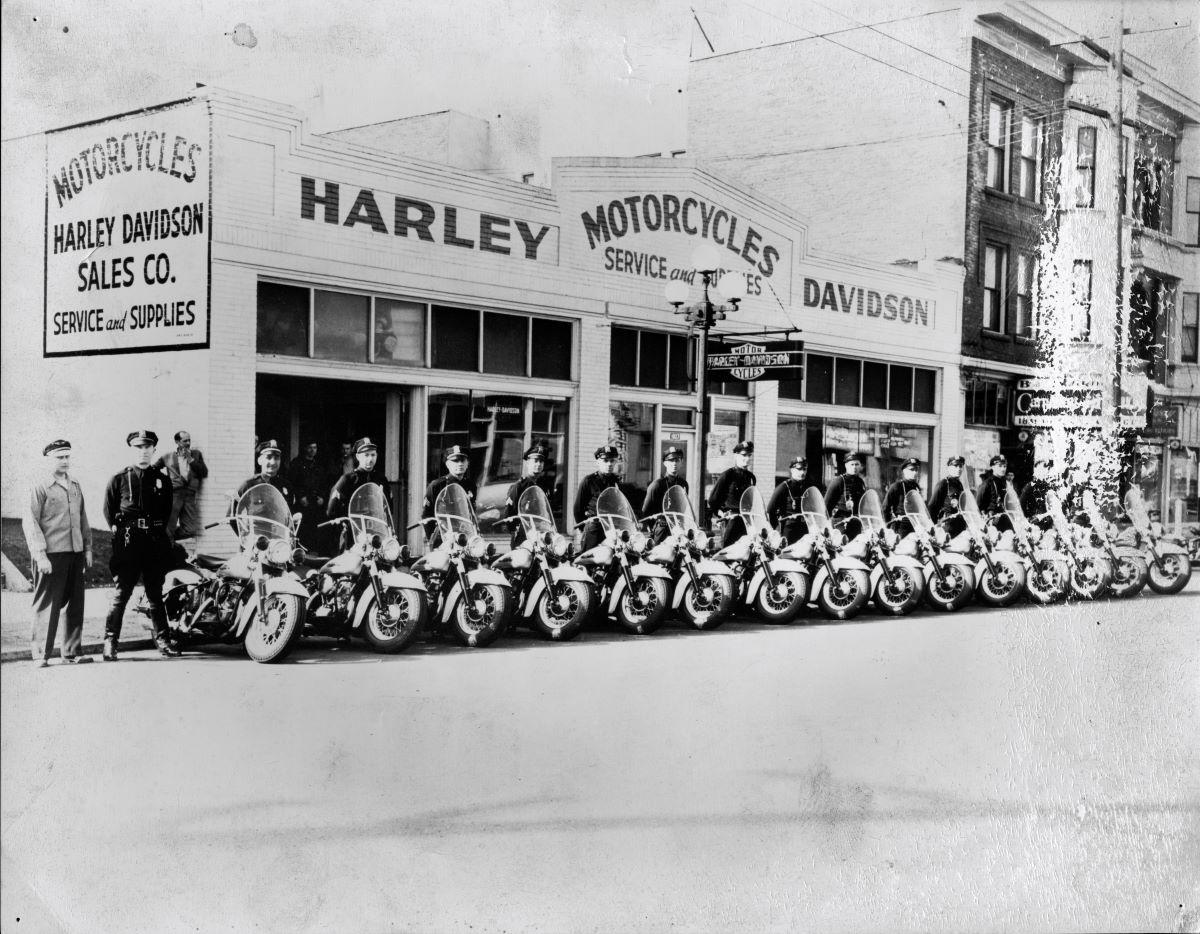 The Seattle Police Department's motorcycle fleet outside a Harley-Davidson dealership in 1940. <a href="https://www.flickr.com/people/24256351@N04">(Seattle Municipal Archives</a>/<a href="https://creativecommons.org/licenses/by/2.0/">CC BY 2.0</a>)