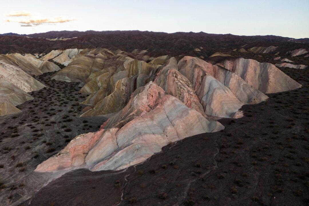 Aerial view of the Cerro Siete Colores (Hill of the Seven Colors) in Calingasta, San Juan province, Argentina, on April 20, 2026. (Photo by Luis ROBAYO / AFP via Getty Images)