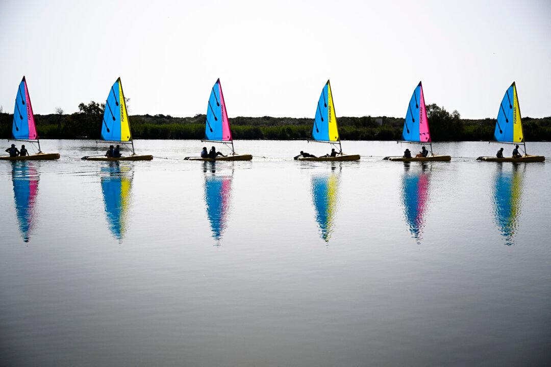 Catamaran sailboats from the Valras-Plage sailing school set sail for a lesson on April 21, 2026. (Photo by Gabriel BOUYS / AFP via Getty Images)