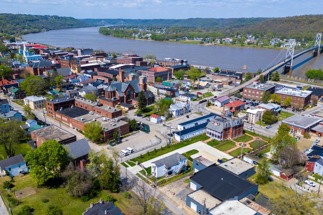 An aerial view looking northwest over Maysville, Ky., on April 10, 2026. The Ohio River, which separates Kentucky and Ohio, and a nearby coal-fired power plant make the area attractive for companies seeking large amounts of electricity and industrial-scale cooling. (Glenn Hartong for The Epoch Times)