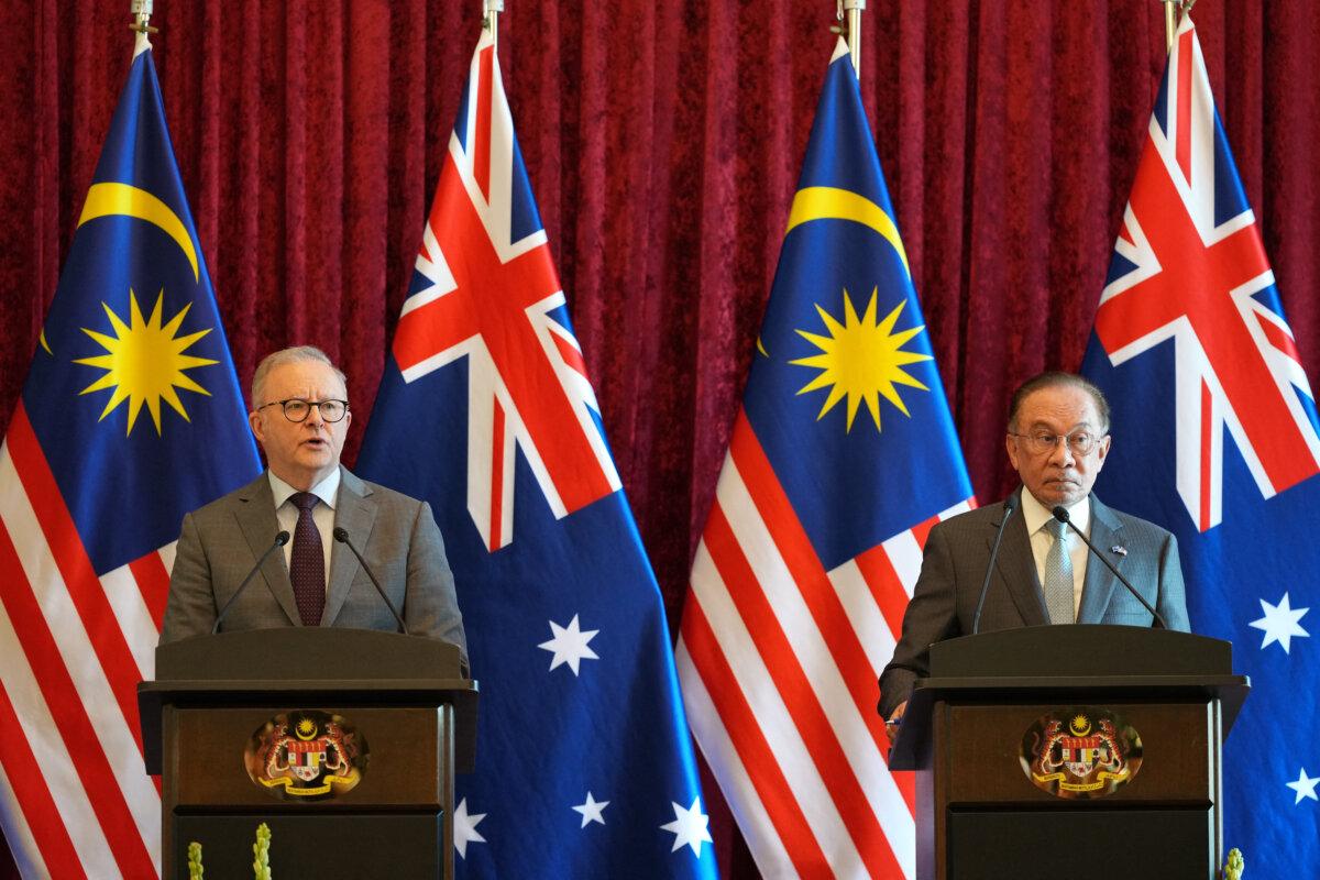 Australia's Prime Minister Anthony Albanese (L) speaks next to Malaysian Prime Minister Anwar Ibrahim during a press conference in Putrajaya, Malaysia, on April 16, 2026. (Vincent Thian/POOL/AFP via Getty Images)