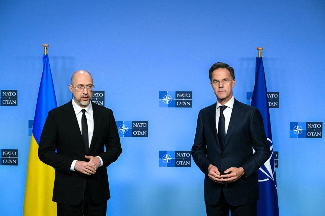 Ukraine’s Prime Minister Denys Shmyhal (L) and NATO Secretary General Mark Rutte address the audience during a press statement at the NATO headquarters in Brussels on Oct. 15, 2025. Prodding by the United States to be more self-reliant in continental defense was already an urgency in most European capitals after Russia’s February 2022 invasion of Ukraine. (Nicolas Tucat/AFP via Getty Images)