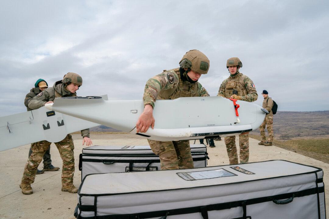 French soldiers dismantle a drone during the Dynamic Front 26 exercise in Cincu, Romania, on Feb. 9, 2026. In response to Trump’s demand that NATO allies commit 5 percent of GDP to defense, members agreed during its 2025 summit to commit 3.5 percent to their militaries and 1.5 percent for infrastructure improvements. (Andrei Pungovschi/Getty Images)