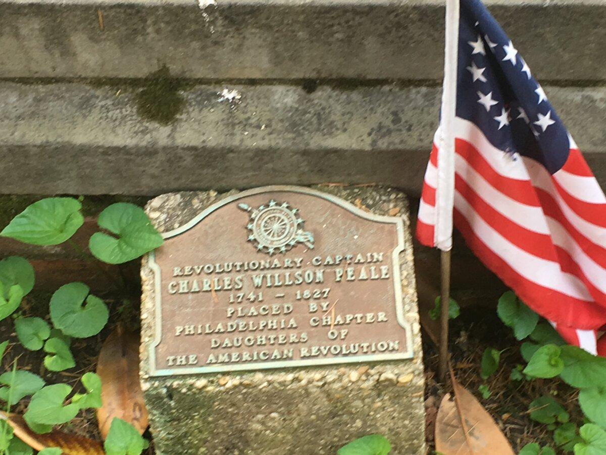 Plaque in front of Peale's gravestone in Philadelphia honoring his Revolutionary War service. (<a href="https://commons.wikimedia.org/w/index.php?title=User:JSCram3254&action=edit&redlink=1">Jared Cram</a>/<a href="https://creativecommons.org/licenses/by-sa/4.0">CC BY-SA 4.0</a>)