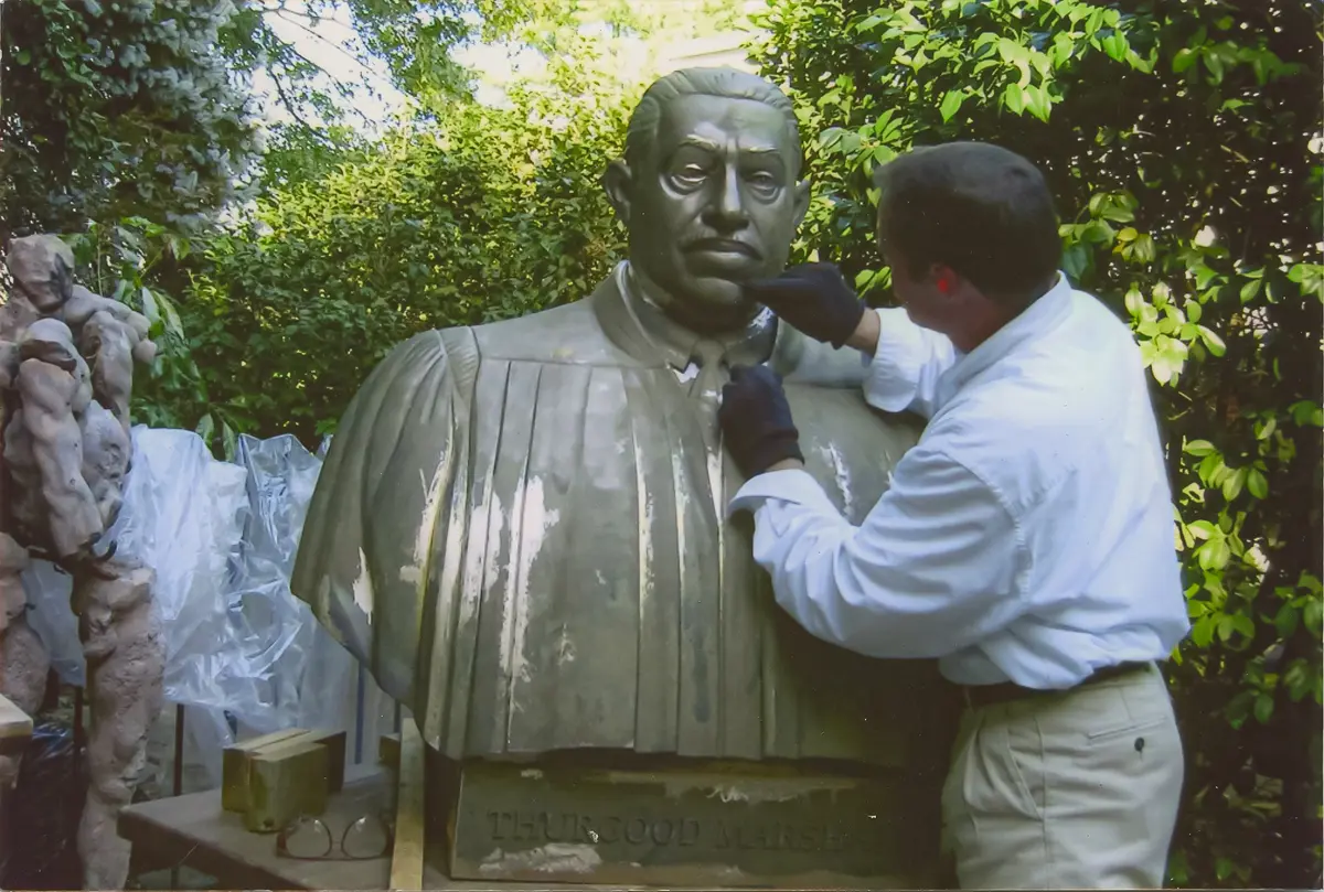 Michael Curtis sculpting the bust of Justice Thurgood Marshall, which is now on installed at the Justice Thurgood Marshall Building in Washington. (Courtesy of Michael Curtis)