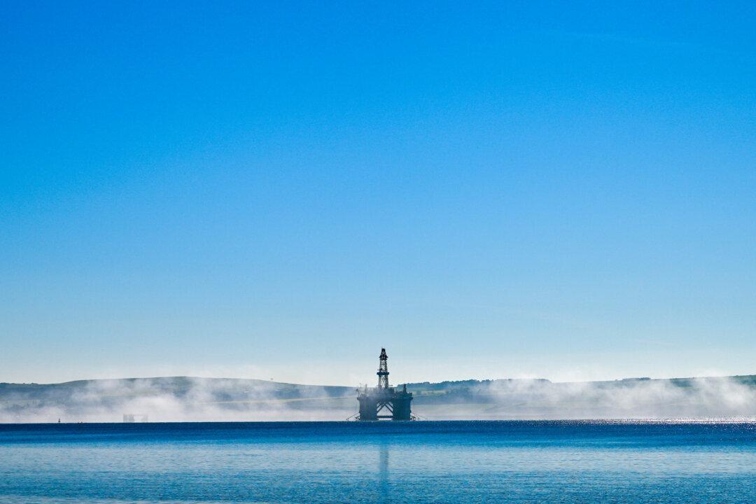 An oil rig is seen through the mist on the Cromarty Firth on the north-east coast of Scotland on April 24, 2026. US President Donald Trump has told the BBC that Starmer could only "recover" from the Mandelson setback if the prime minister "opened the North Sea" to increase oil and gas extraction. (Photo by Andy BUCHANAN / AFP via Getty Images)