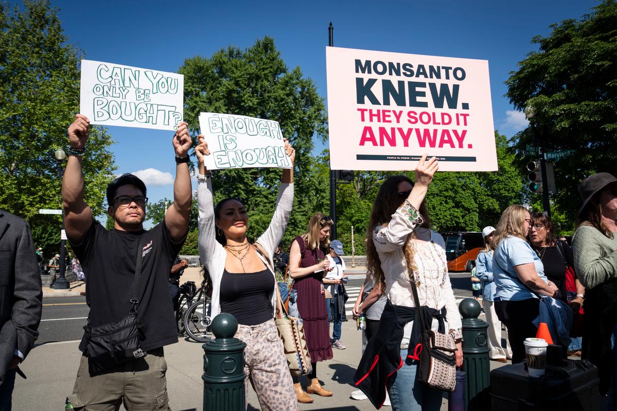 Protesters take part in a "People vs. Poison" rally against pesticides while the Supreme Court hears a pesticide liability case in Washington on April 27, 2026. (Madalina Kilroy/The Epoch Times)