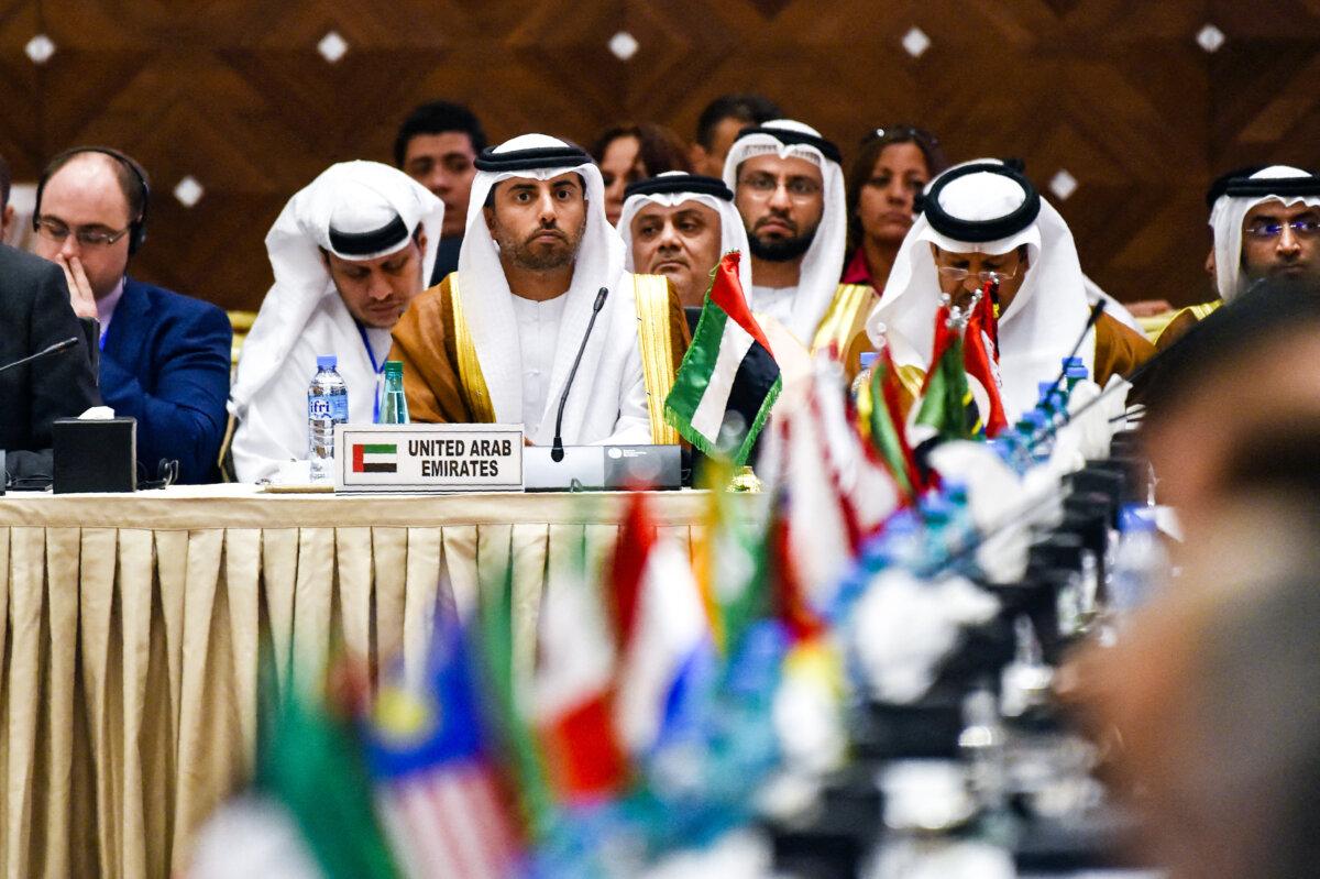 What to Know About UAE Leaving OPEC | USNN World News United Arab Emirates Energy Minister Suhail al-Mazrouei (C) attends an informal meeting between members of the Organization of Petroleum Exporting Countries (OPEC) in Algiers, Algeria, on Sept. 28, 2016. (Ryad Kramdi/AFP via Getty Images)