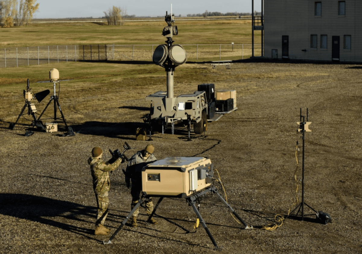 U.S. airmen set up drone defense gear during an exercise at Minot Air Force Base in Minor, N.D., on Oct. 24, 2025. (John Ingle/Department of Defense)