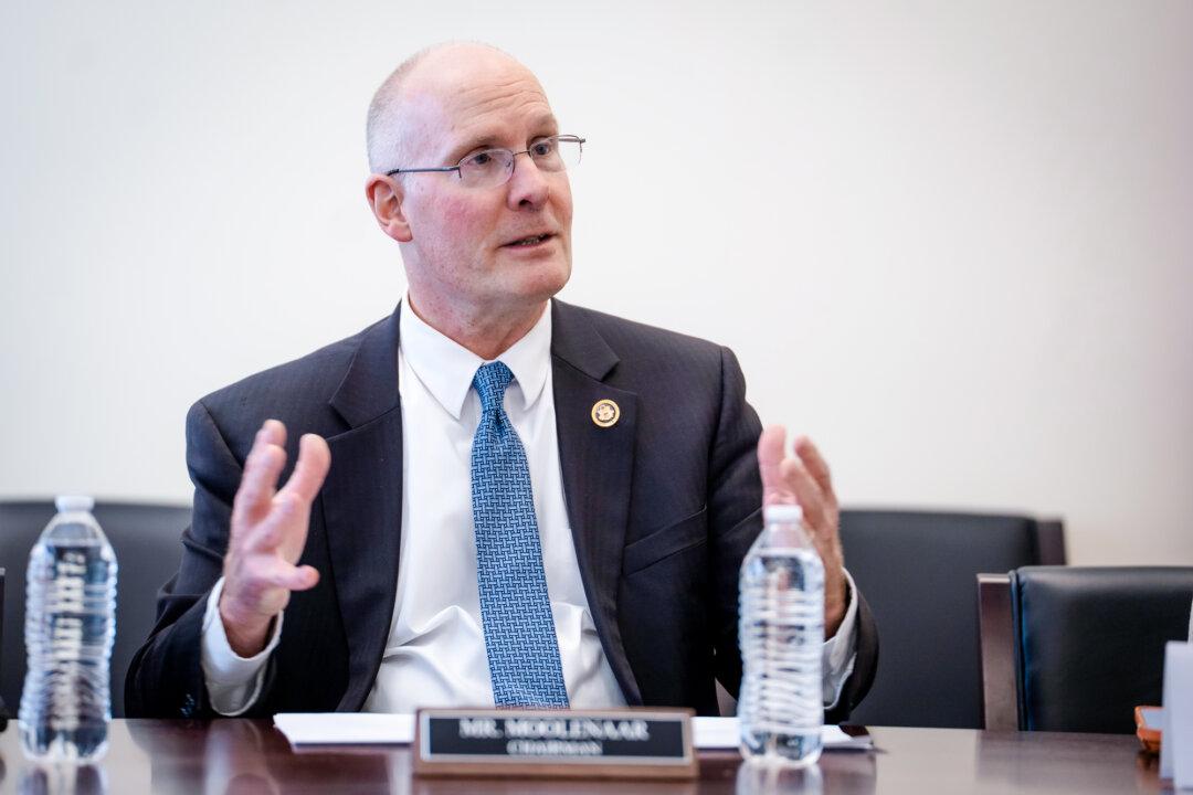 Rep. John Moolenaar (R-Mich.), chairman of the House Select Committee on the Chinese Communist Party, speaks during a press conference on Capitol Hill in Washington on March 19, 2026. (Madalina Kilroy/The Epoch Times)