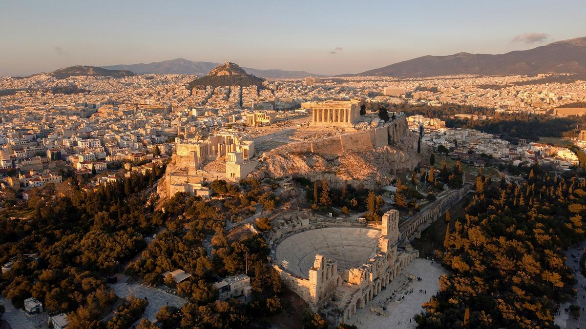 Athens's history goes back over 3,000 years. Today, it blends ancient landmarks with a modern metropolitan environment. (Jim Niakaris/Unsplash)