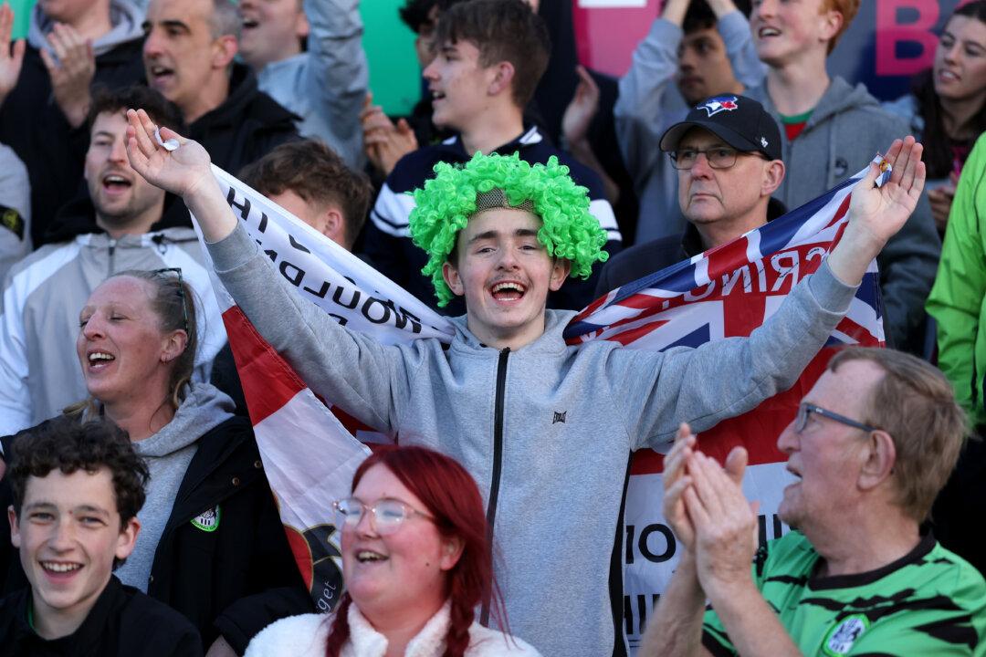 BOREHAMWOOD, ENGLAND - APRIL 29: A fan of Forest Green Rovers cheers prior to the Enterprise National League Promotion Play-offs Qualifying Round match between Boreham Wood and Forest Green Rovers at Mangata Pay UK Stadium in Borehamwood, England, on April 29, 2026. (Justin Setterfield/Getty Images)