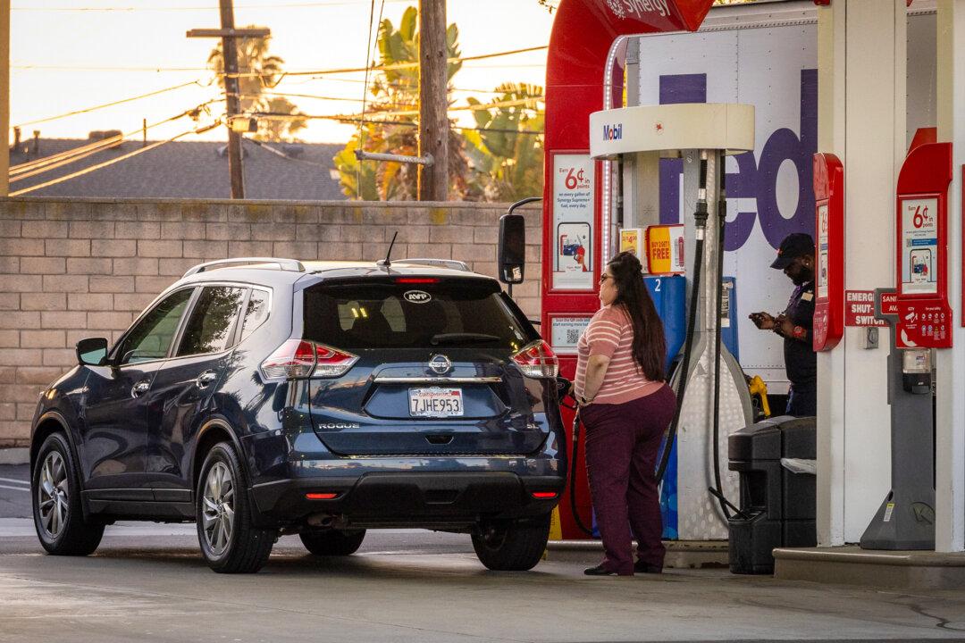Customers fill up with gas in Los Angeles on March 11, 2026. Despite higher prices, Americans have not faced shortages due to the country’s “high degree of energy security,” analyst David Blackmon said. (John Fredricks/The Epoch Times)