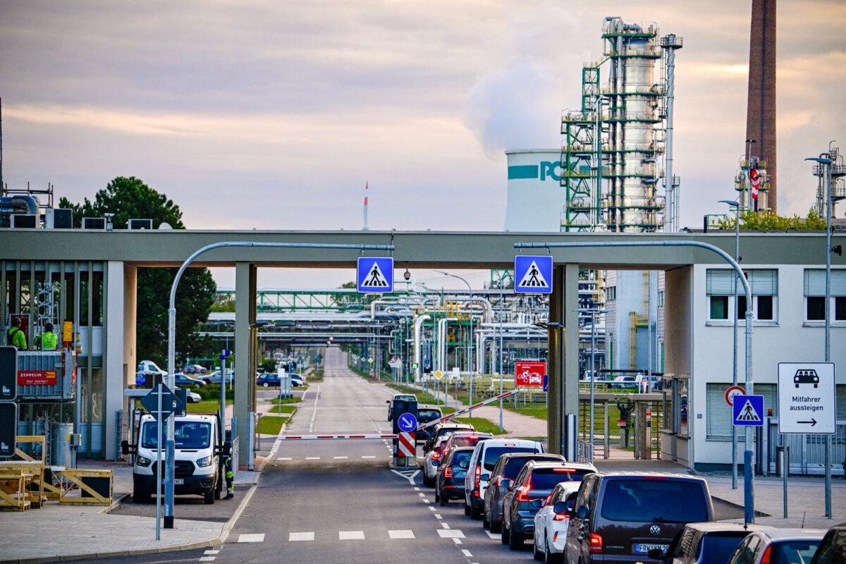 Cars line up at an entry gate to the PCK Schwedt refinery in Schwedt, Germany, on April 30, 2026. (Tobias Schwarz/AFP via Getty Images)