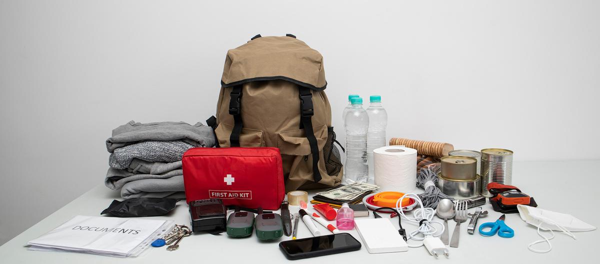 A well-prepared emergency kit includes water, food, medications, flashlights, batteries, important documents, and basic first-aid supplies. (Skylines/Shutterstock)