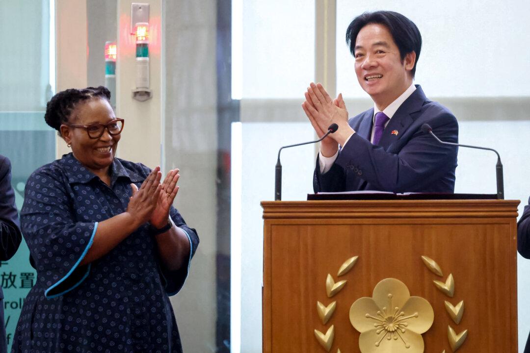 Taiwan President Lai Ching-te (R) and Eswatini Deputy Prime Minister Thulisile Dladla (L) arrive at Taiwan Taoyuan International Airport after Lai’s visit to Eswatini in Taoyuan, Taiwan, on May 5, 2026. A previously scheduled April trip was canceled amid pressure from Beijing. (I-Hwa Cheng/AFP via Getty Images)