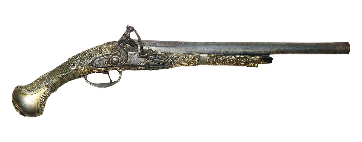 Antique guns, especially those from the 17th to 19th centuries, often feature carvings along the wooden stock and engravings on the metal barrel or lock. (Yuriy Boyko_Ukraine/Shutterstock)
