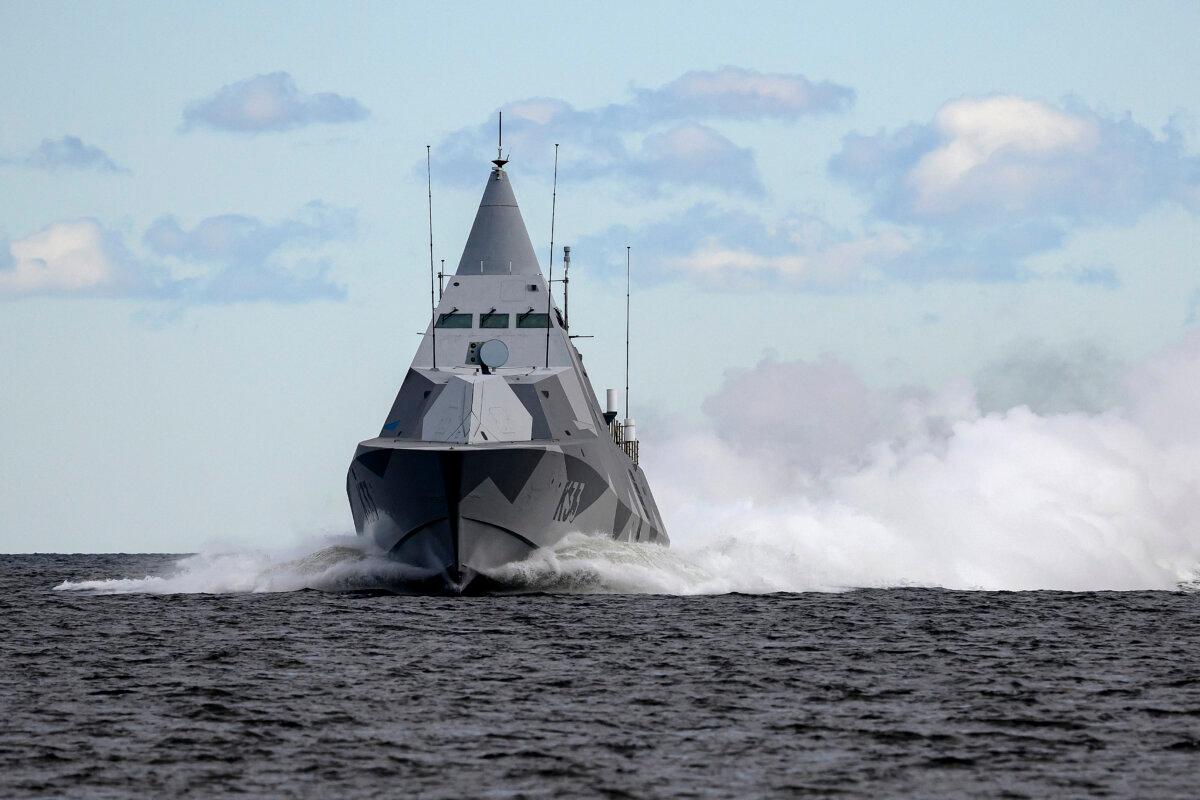 Swedish Navy's HMS Harnosand (K33), the third Visby-class corvette, operates during Exercise Aurora 26 at Vaddo Military Training Area in Stockholm, Sweden, on May 5, 2026. (Henrik Montgomery/TT / various sources / AFP via Getty Images)