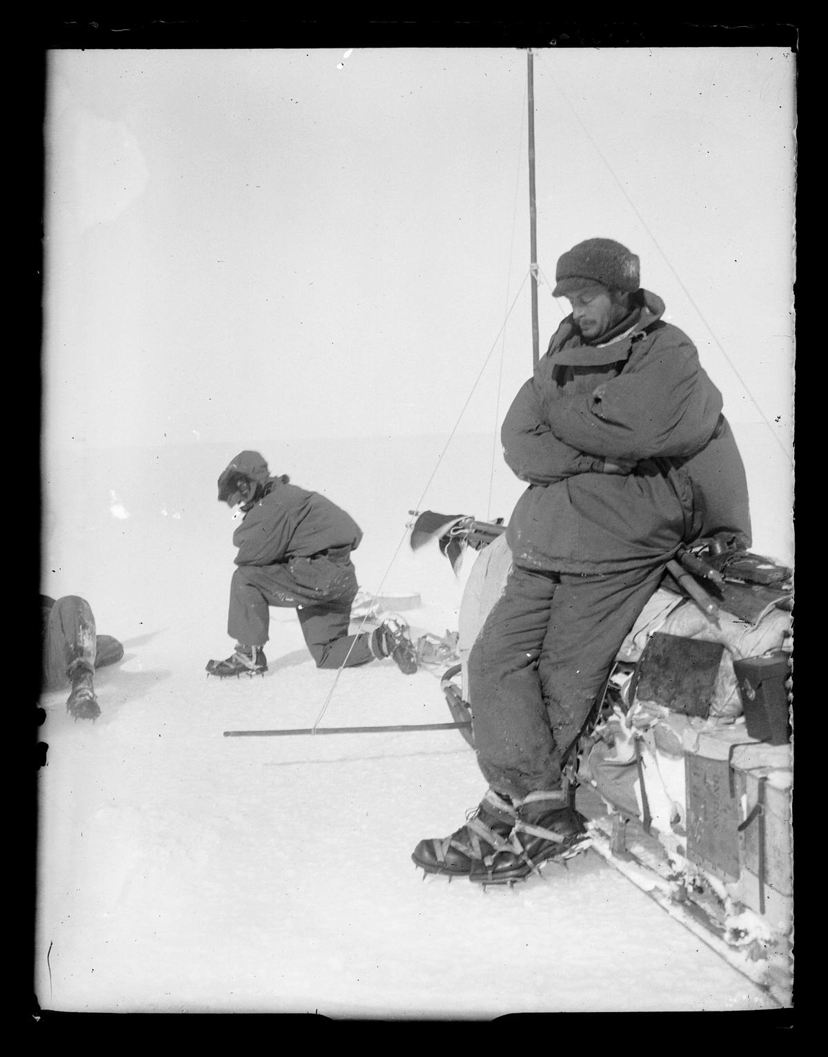 Douglas Mawson rests against a sledge in Adélie Land, Antarctica, in 1912. (State Library of New South Wales/Public domain)