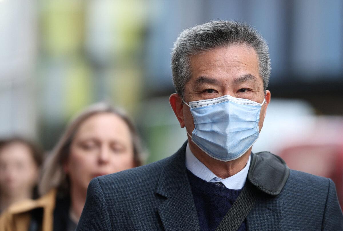 Chung Biu Yuen arrives at the Old Bailey court during a trial where he and co-defendant Chi Leung Wai are accused of assisting a foreign intelligence service in London on May 6, 2026. (Toby Melville/Reuters)