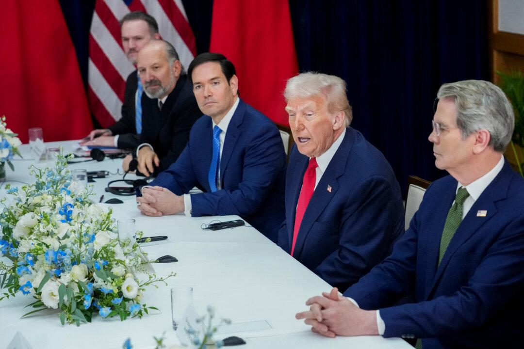 President Donald Trump (2nd R) speaks during a bilateral meeting with Chinese leader Xi Jinping at Gimhae Air Base in Busan, South Korea, on Oct. 30, 2025. Beijing agreed to pause for a year its control that would ban exports of any rare earths sourced from China or using Chinese processing technology. (Andrew Harnik/Getty Images)