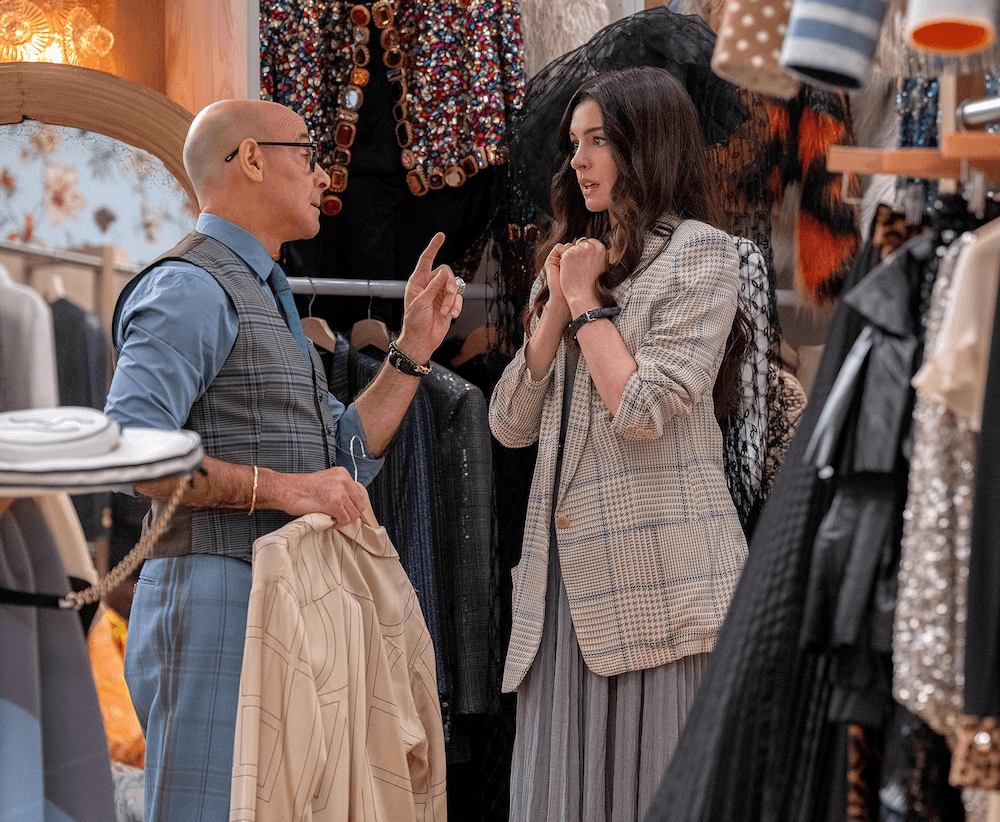 Nigel (Stanley Tucci) dresses Andy (Anne Hathaway) for a party in the Hamptons, in "The Devil Wears Prada 2." (20th Century Studios)