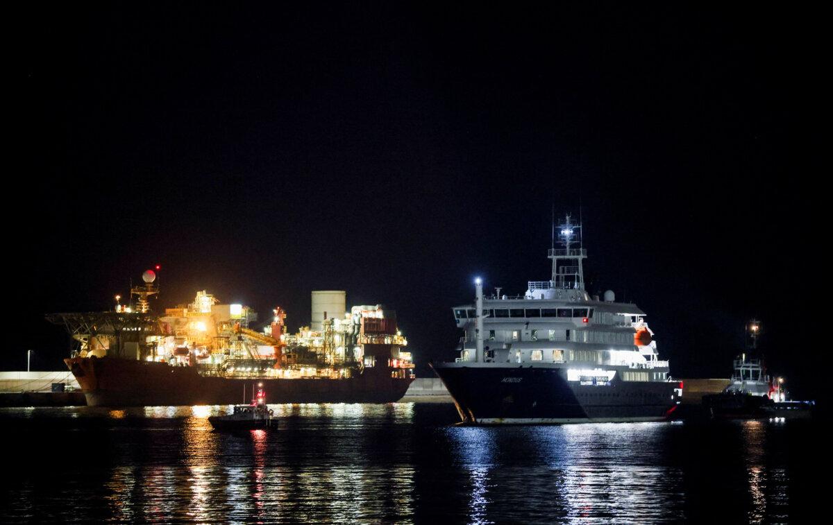 The cruise ship MV Hondius arrives at the port of Granadilla de Abona after being affected by a hantavirus outbreak, in Tenerife, Spain, on May 10, 2026. (Hannah McKay/Reuters)
