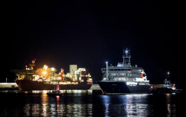 The cruise ship MV Hondius arrives at the port of Granadilla de Abona after being affected by a hantavirus outbreak, in Tenerife, Spain, on May 10, 2026. (Hannah McKay /Reuters0