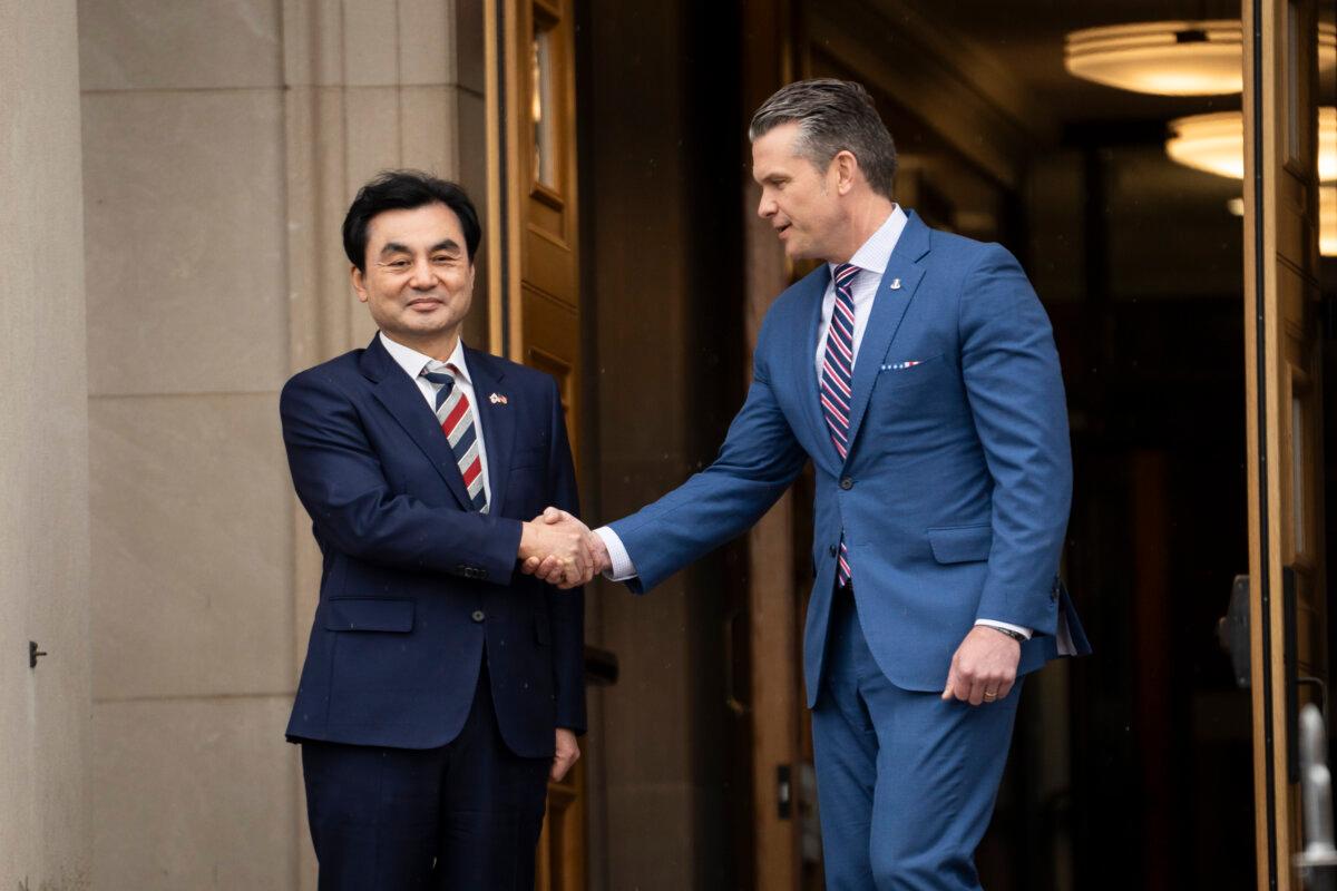 U.S. Secretary of War Pete Hegseth hosts an enhanced honor cordon and meeting welcoming South Korean Minister of National Defense Ahn Gyu-Back to the Pentagon in Arlington, Va., on May 11, 2026. (Madalina Kilroy/The Epoch Times)