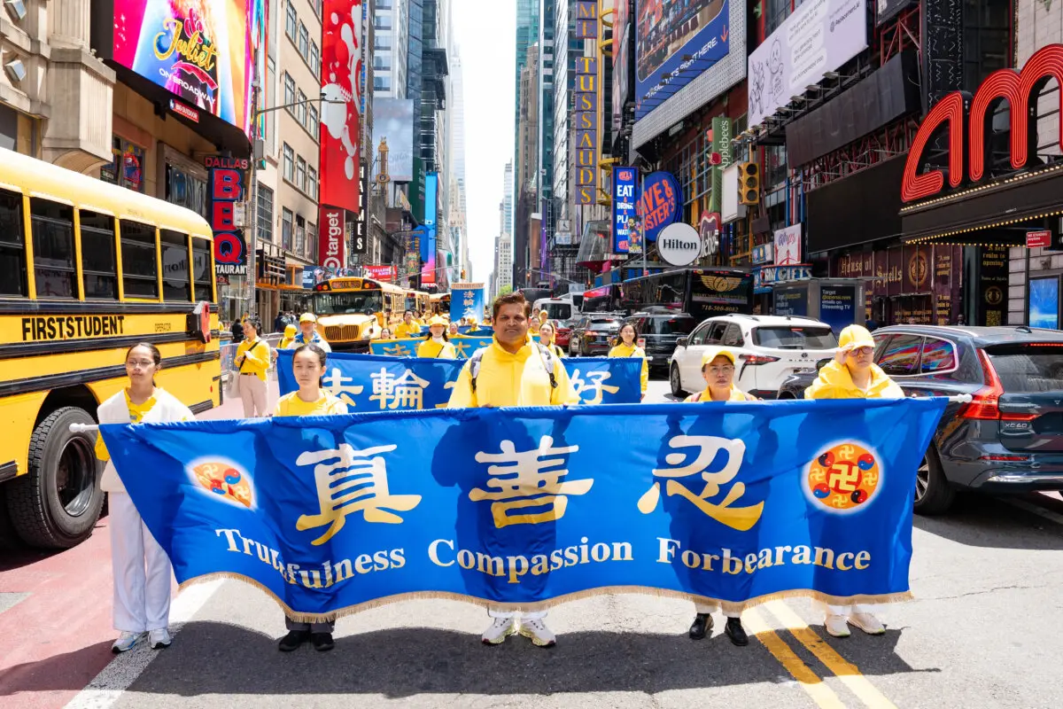 Falun Gong practitioners take part in a parade to celebrate World Falun Dafa Day and call for an end to persecution in China, in New York City, on May 13, 2026. (Samira Bouaou/The Epoch Times)