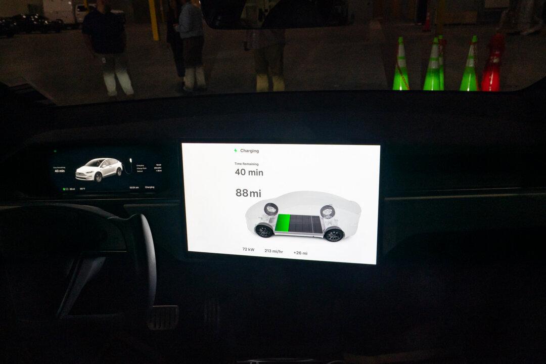 A computer screen shows charging progress inside an EV at fast-charger manufacturer Kempower in Durham, N.C., on April 23, 2024. Automotive functional safety expert Sandeep Kumar Bomthapalli said missing data—such as charge cycles and temperature exposure—is critical to determining whether a retired EV battery can be reused. (Allison Joyce/AFP via Getty Images)