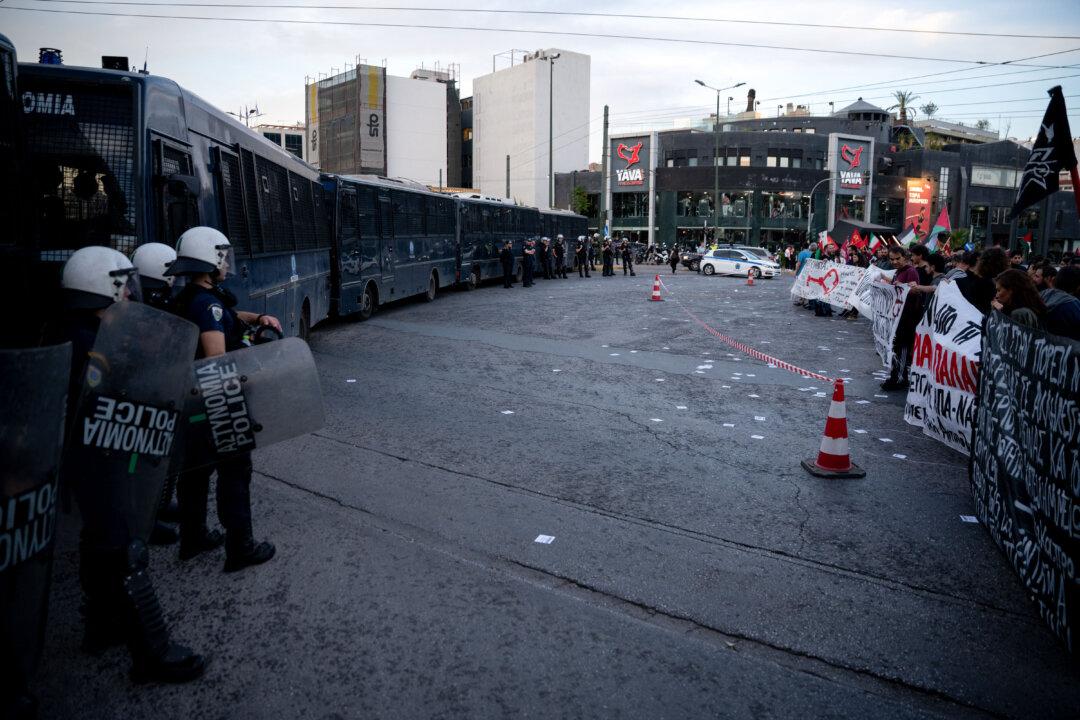 Greek riot police face protestors during a demonstration outside the Israeli embassy to mark the 78th anniversary of Nakba in Athens on May 15, 2026. (Photo by Aggelos NAKKAS / AFP via Getty Images)