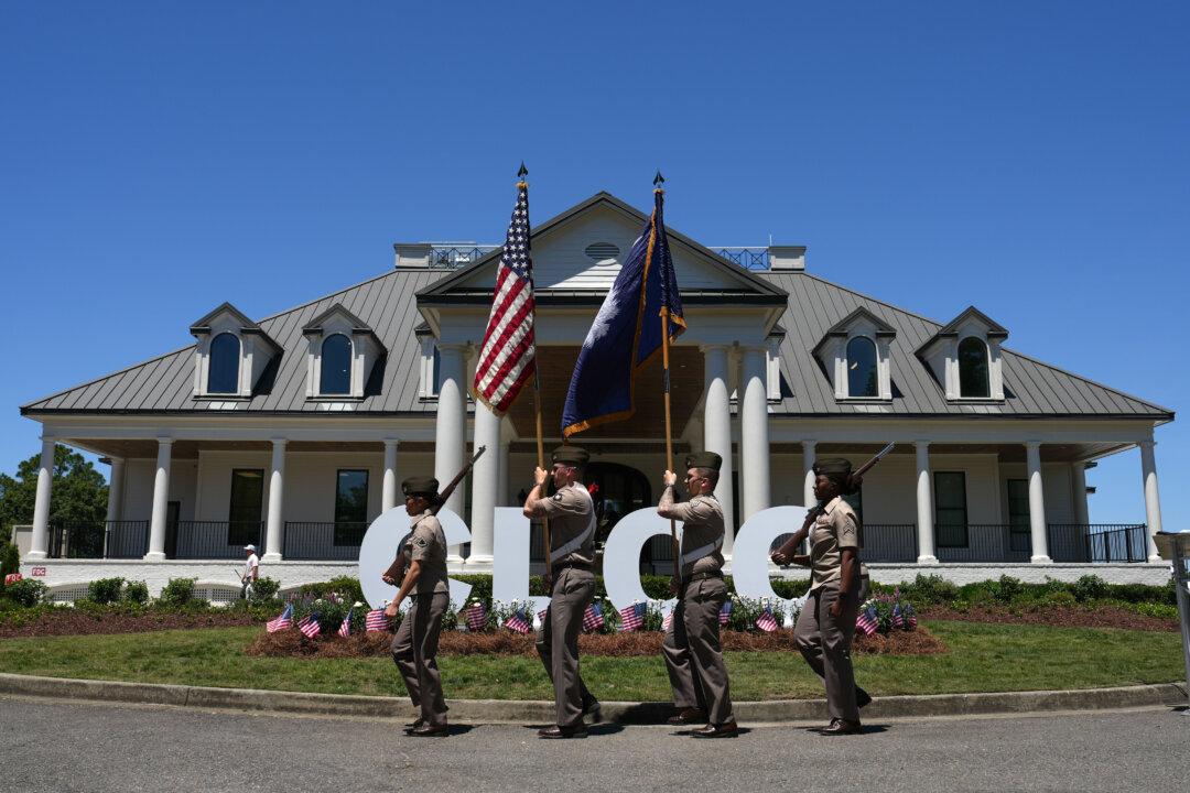 ELGIN, SOUTH CAROLINA - MAY 15: The color guard marches at a Folds Of Honor military appreciation ceremony in front of the clubhouse during the second round of the Colonial Life Charity Classic 2026 at The Woodcreek Club on May 15, 2026 in Elgin, South Carolina. (Photo by Raj Mehta/Getty Images)