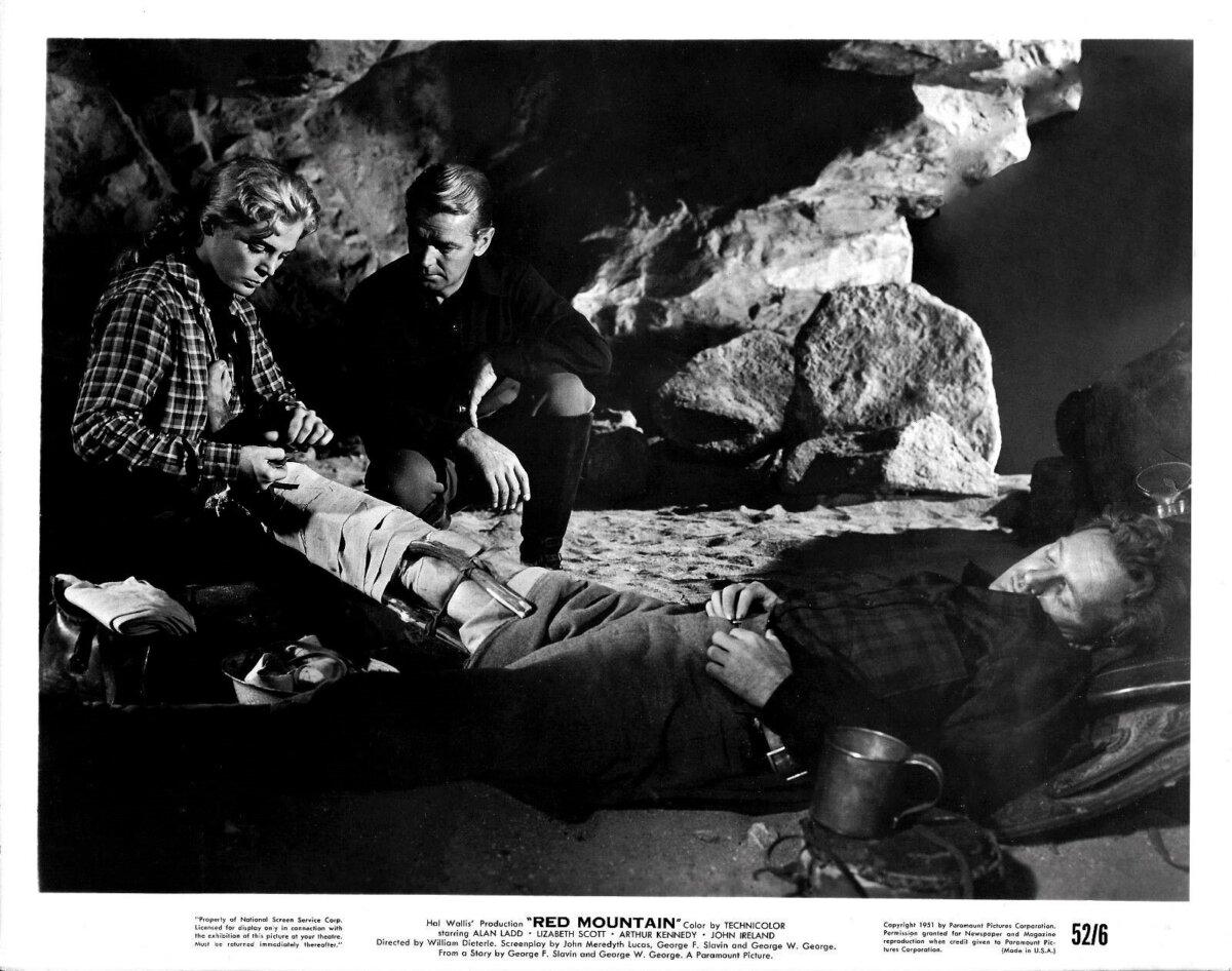 (L–R) Chris (Lizabeth Scott), Capt. Brett Sherwood (Alan Ladd), and Lane Waldron (Arthur Kennedy), in “Red Mountain.” (Paramount Pictures/MovieStillsDB)