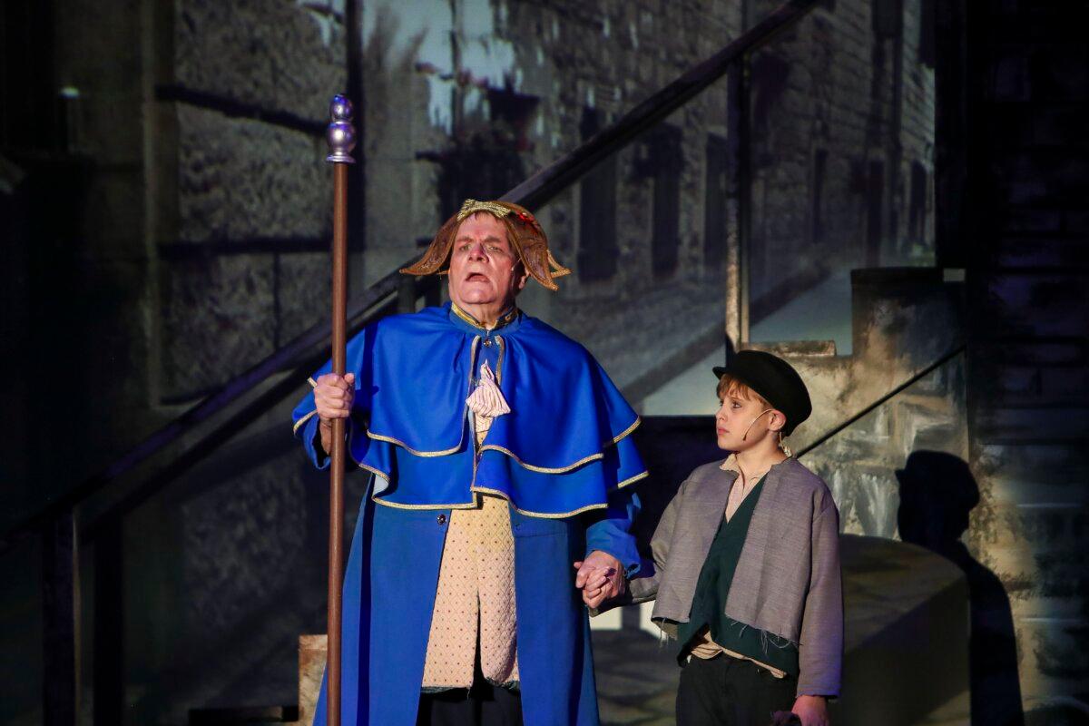 Don J. Orlando as Mr. Bumble and talented Spencer Schillenger as Oliver, in “Lionel Bart’s Oliver!” (Courtesy of Music on Stage)